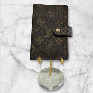 Louis Vuitton Passport Holder in Monogram.
